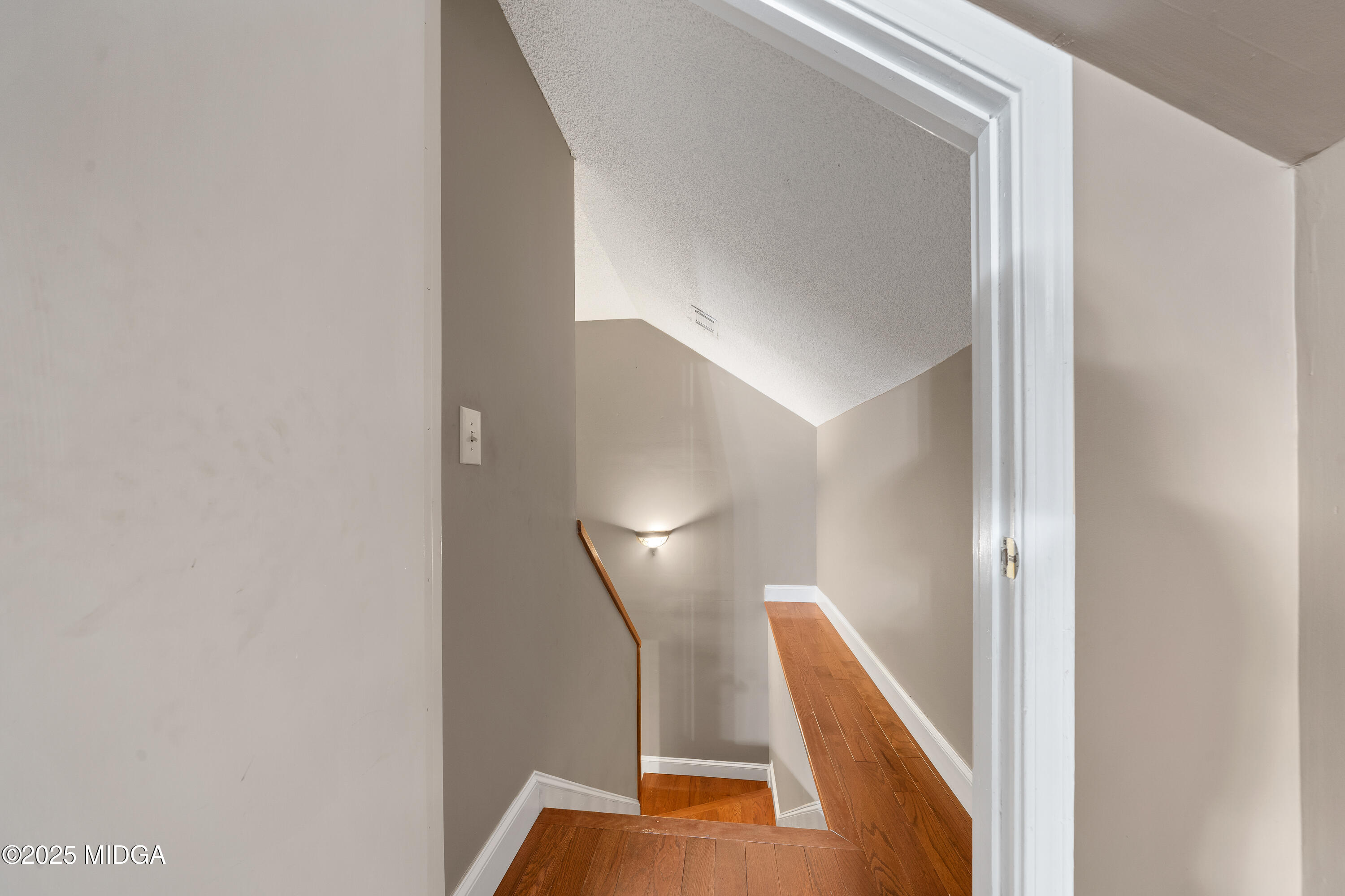 299 Colvin Road Forsyth, GA 31029 - Photo 27 of 51 a view of a hallway with furniture