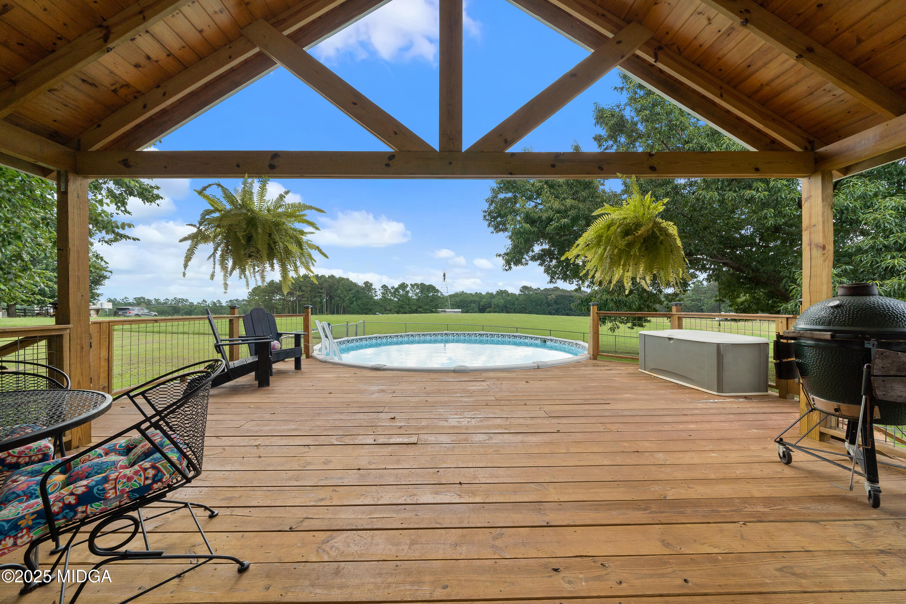 299 Colvin Road Forsyth, GA 31029 - Photo 3 of 51 a view of a swimming pool with a patio
