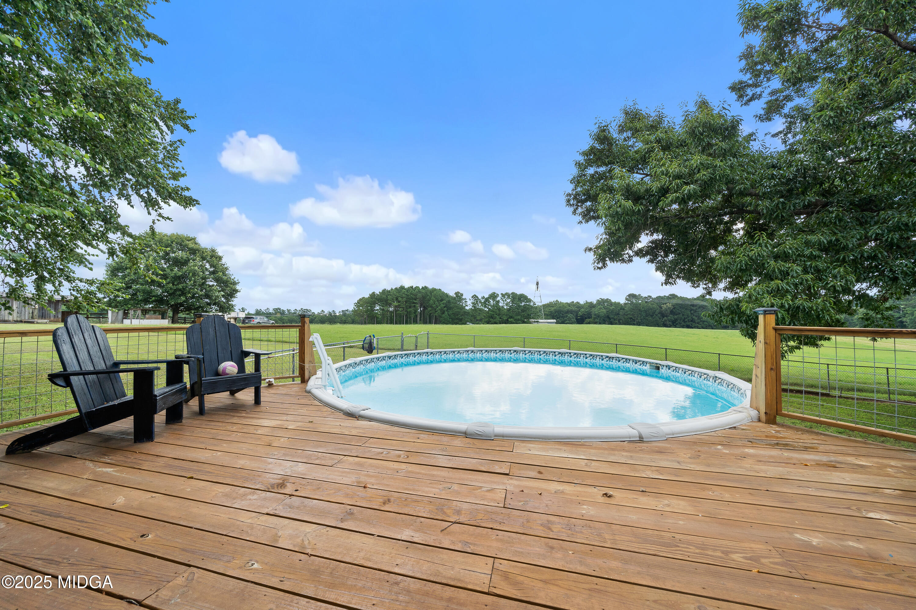 299 Colvin Road Forsyth, GA 31029 - Photo 32 of 51 a view of a swimming pool with a lounge chair