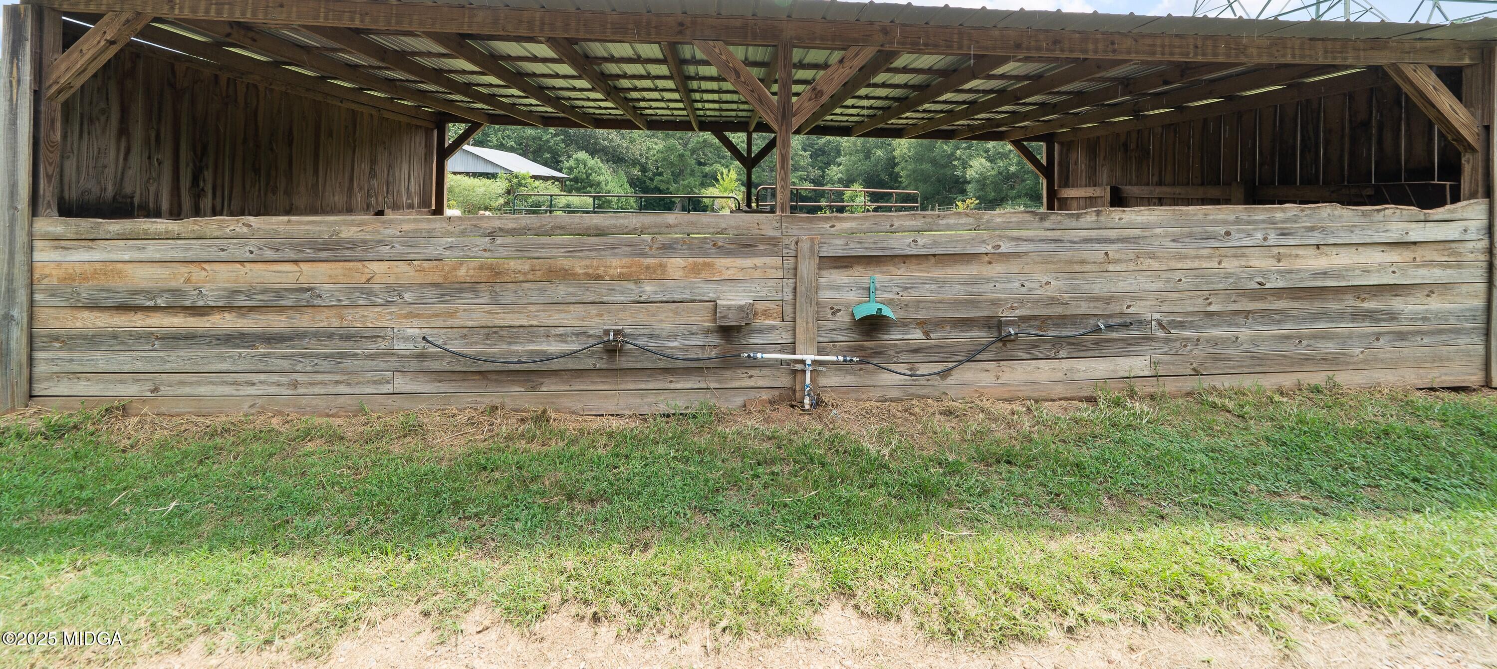 299 Colvin Road Forsyth, GA 31029 - Photo 45 of 51 a view of backyard with wooden fence