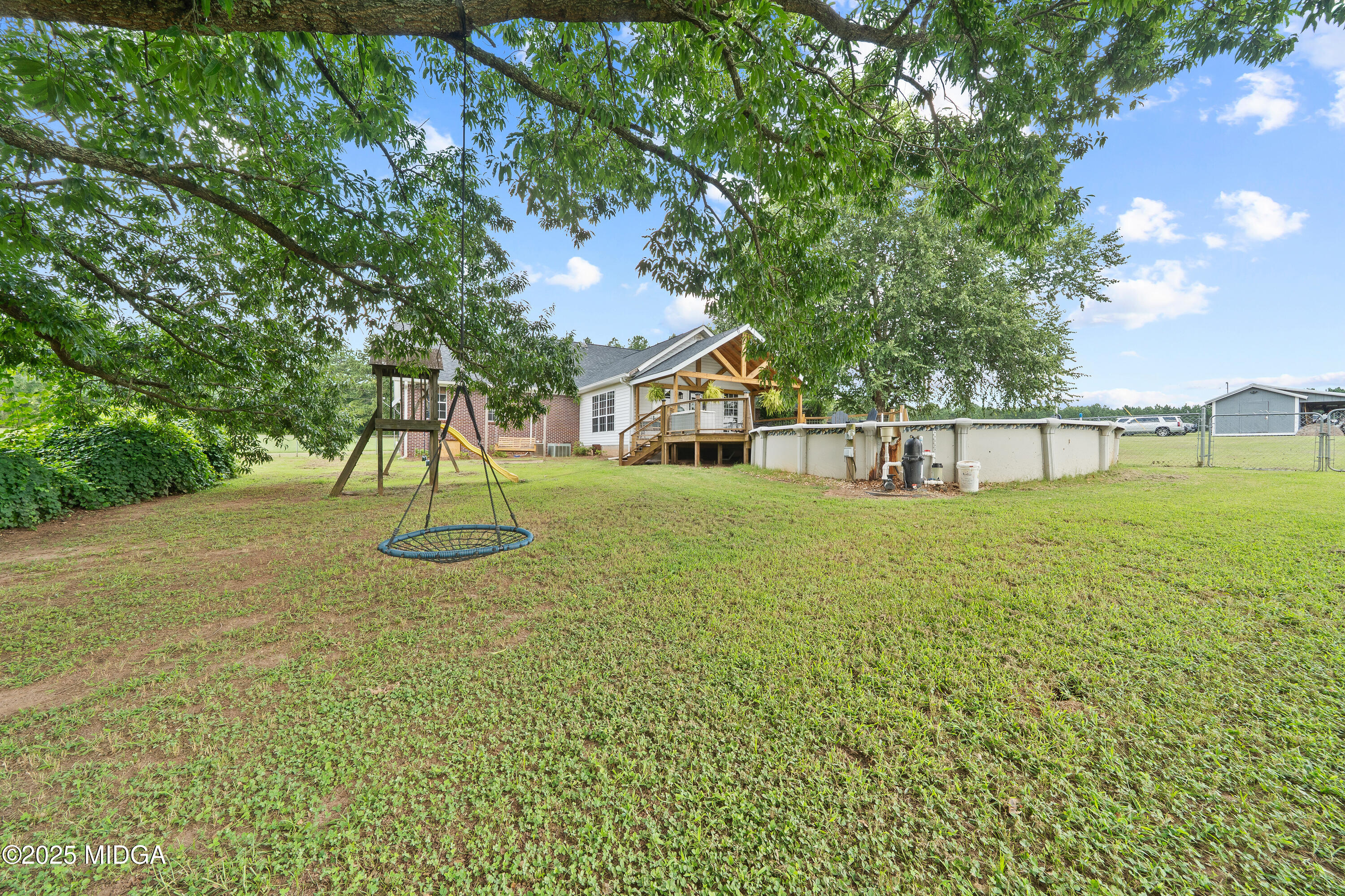 299 Colvin Road Forsyth, GA 31029 - Photo 51 of 51 a view of a house with a yard