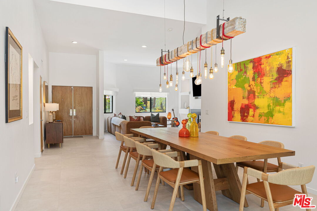 1414 Sagebrush Road Palm Springs, CA 92264 - Photo 12 of 48 a view of a dining room with furniture