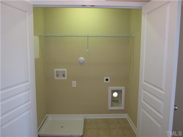 9125 Falkwood Road, Unit 163 Raleigh, NC 27617 - Photo 11 of 23 The laundry room area is conveniently located near the master bedroom. No more walking up and down the steps.