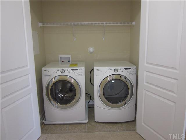 9125 Falkwood Road, Unit 163 Raleigh, NC 27617 - Photo 12 of 23 The front loaded washer and dryer fit nicely in the space but are not included.
