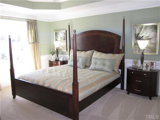 9125 Falkwood Road, Unit 163 Raleigh, NC 27617 - Photo 13 of 23 The Harding model easily shows how a queen size be can fit in this space. The tray ceiling adds extra height to the room. This is a must see feature!