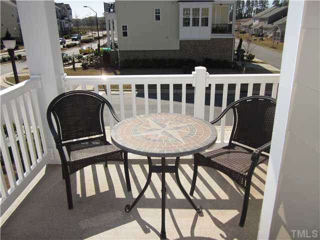 9125 Falkwood Road, Unit 163 Raleigh, NC 27617 - Photo 19 of 23 Balcony off of the living space is perfect for drinking a cup of coffee or sun bathing.