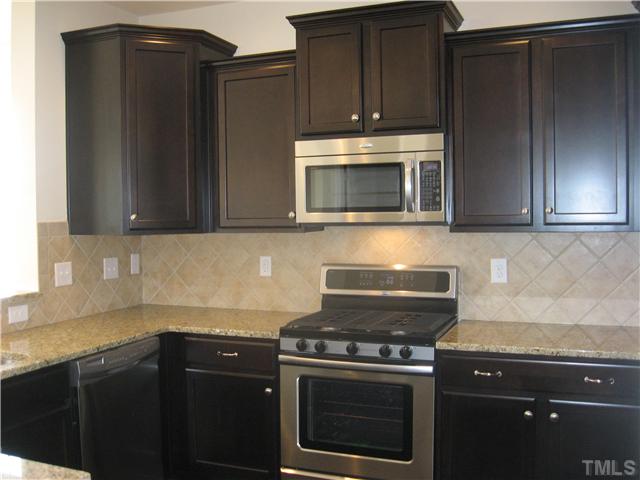 9125 Falkwood Road, Unit 163 Raleigh, NC 27617 - Photo 5 of 23 42" inch Kona cabinets with stainless steel appliances!