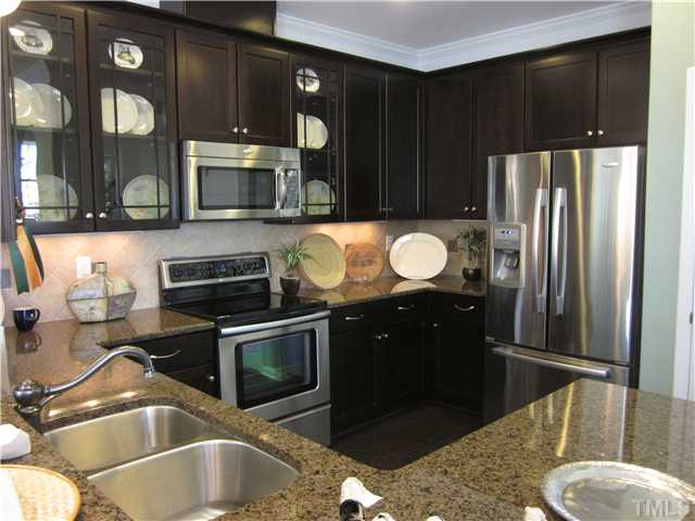 9125 Falkwood Road, Unit 163 Raleigh, NC 27617 - Photo 6 of 23 This is a photo of the Harding model. It shows you the decorating potential for this kitchen.