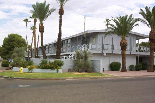 625 South Power Road, Unit 367 Mesa, AZ 85206 - Photo 1 of 4 a front view of a house with a yard and garage