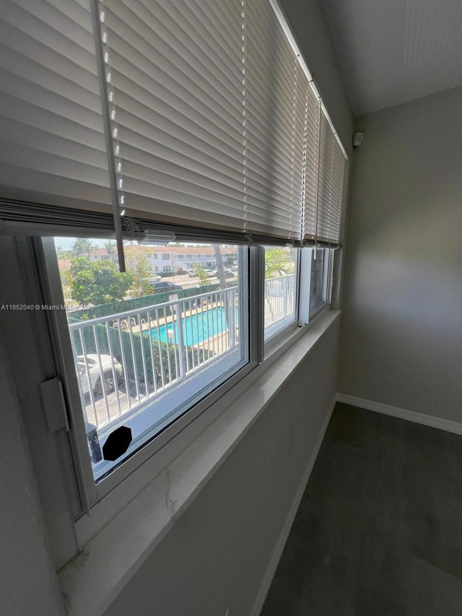 2175 Northeast 56th Street, Unit 211 Fort Lauderdale, FL 33308 - Photo 5 of 15 a view of an entryway