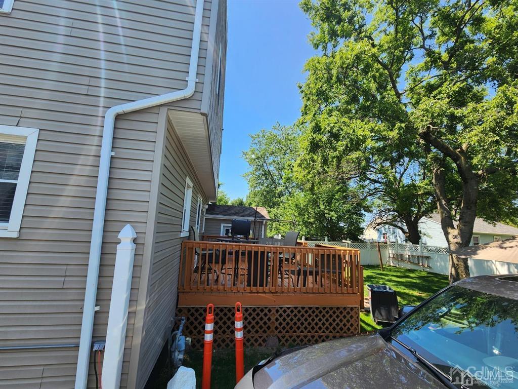 184 Raritan Street Keyport, NJ 07735 - Photo 17 of 24 a view of a roof deck with wooden fence and plants