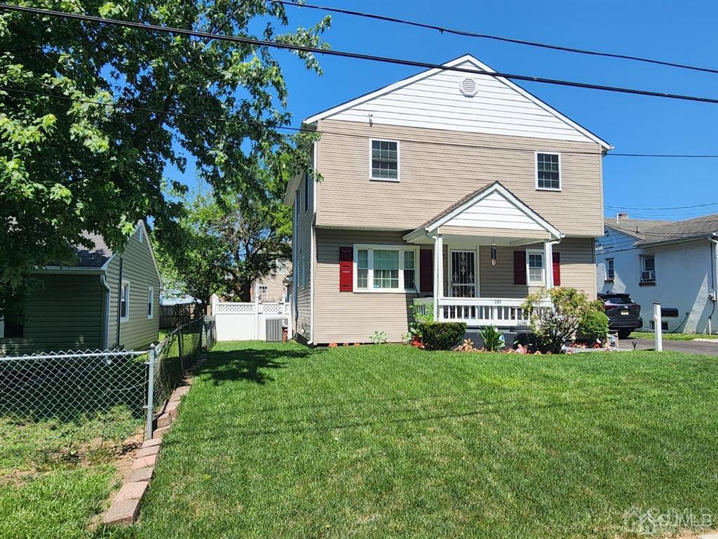 184 Raritan Street Keyport, NJ 07735 - Photo 18 of 24 a front view of a house with a yard
