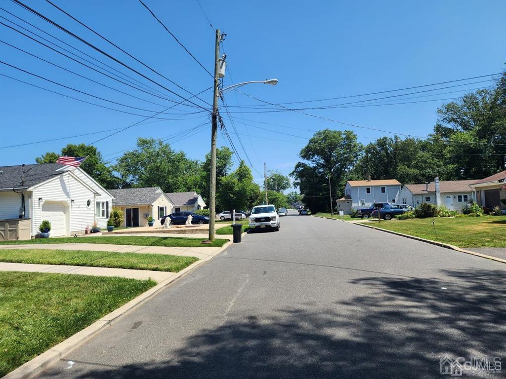 184 Raritan Street Keyport, NJ 07735 - Photo 24 of 24 a front view of a house with a garden and yard