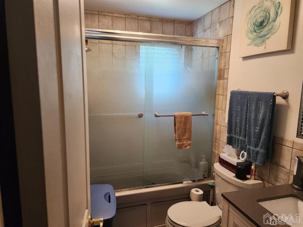 184 Raritan Street Keyport, NJ 07735 - Photo 5 of 24 a bathroom with a sink toilet and shower