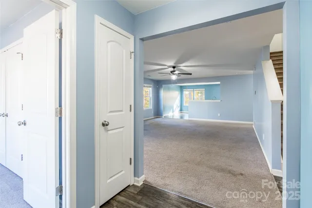 a view of livingroom and hardwood floor