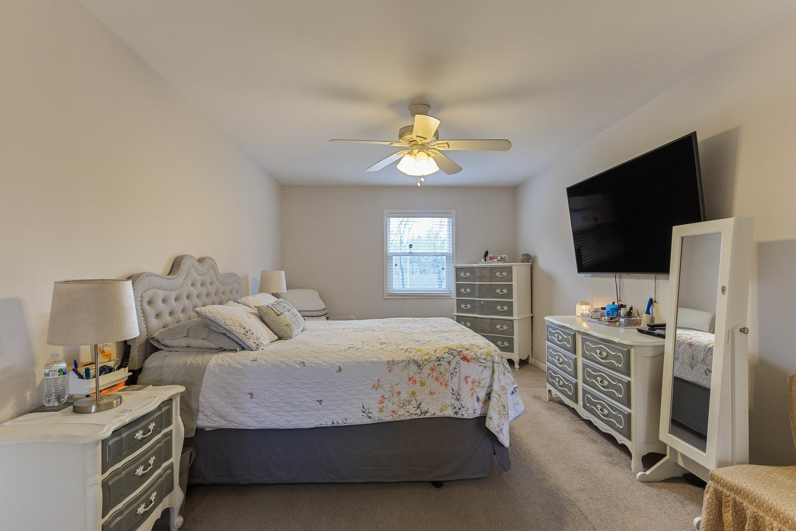 524 Spruce Road Bolingbrook, IL 60440 - Photo 19 of 33 a bedroom with a bed and a flat screen tv