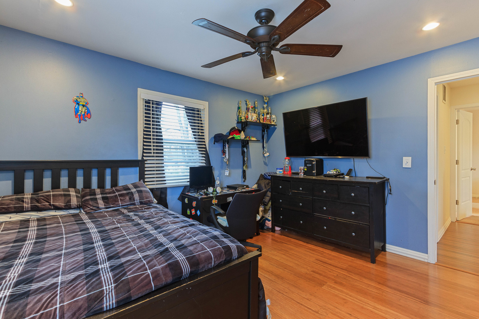 524 Spruce Road Bolingbrook, IL 60440 - Photo 24 of 33 a bedroom with a bed and a flat screen tv