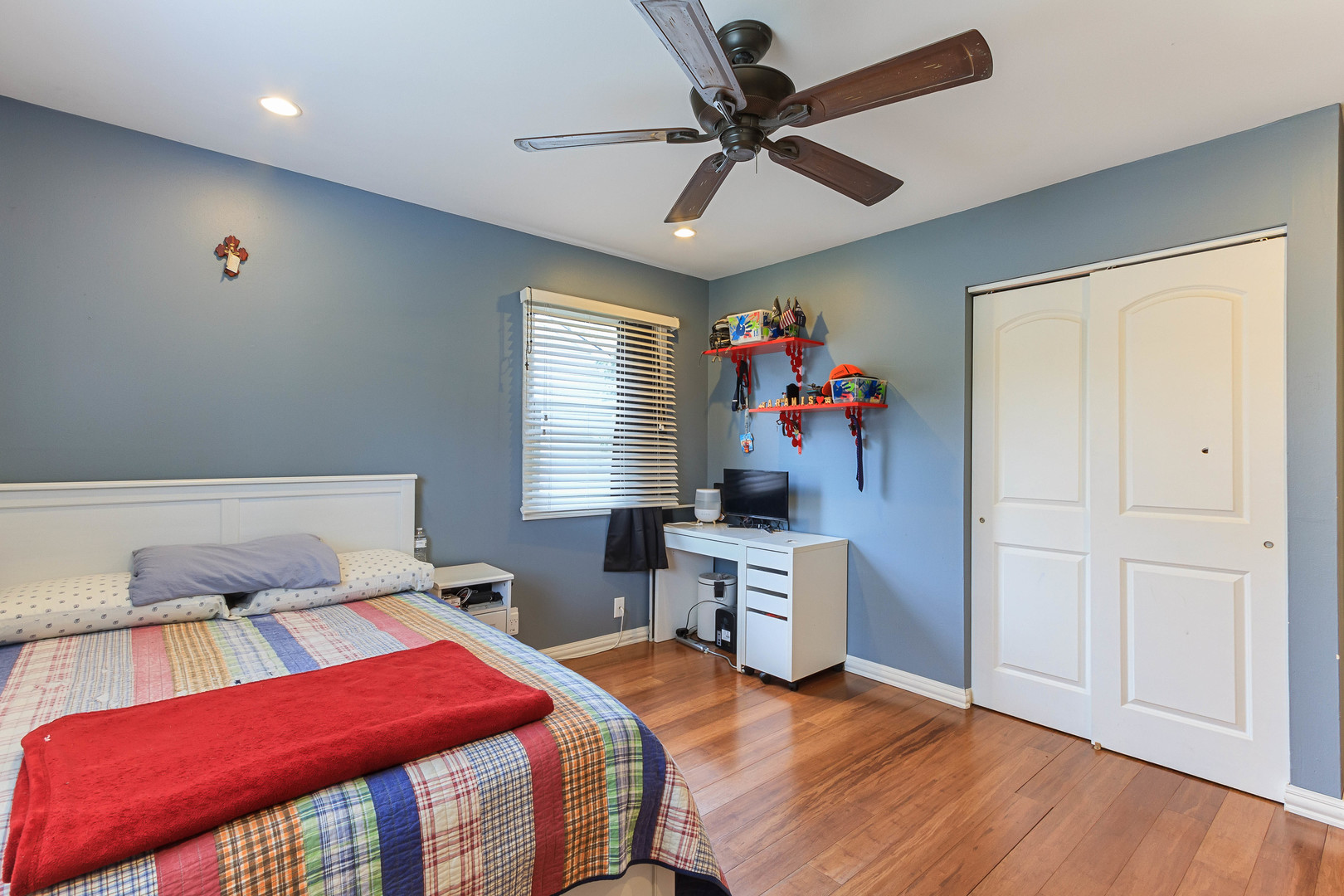 524 Spruce Road Bolingbrook, IL 60440 - Photo 26 of 33 a bedroom with a bed and a chandelier