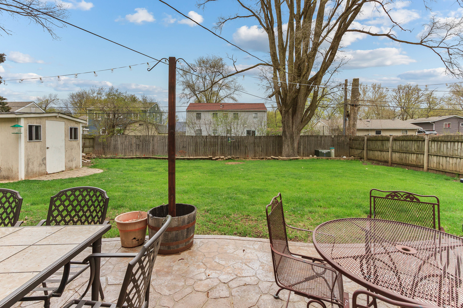 524 Spruce Road Bolingbrook, IL 60440 - Photo 29 of 33 a view of a patio with a table chairs and a table