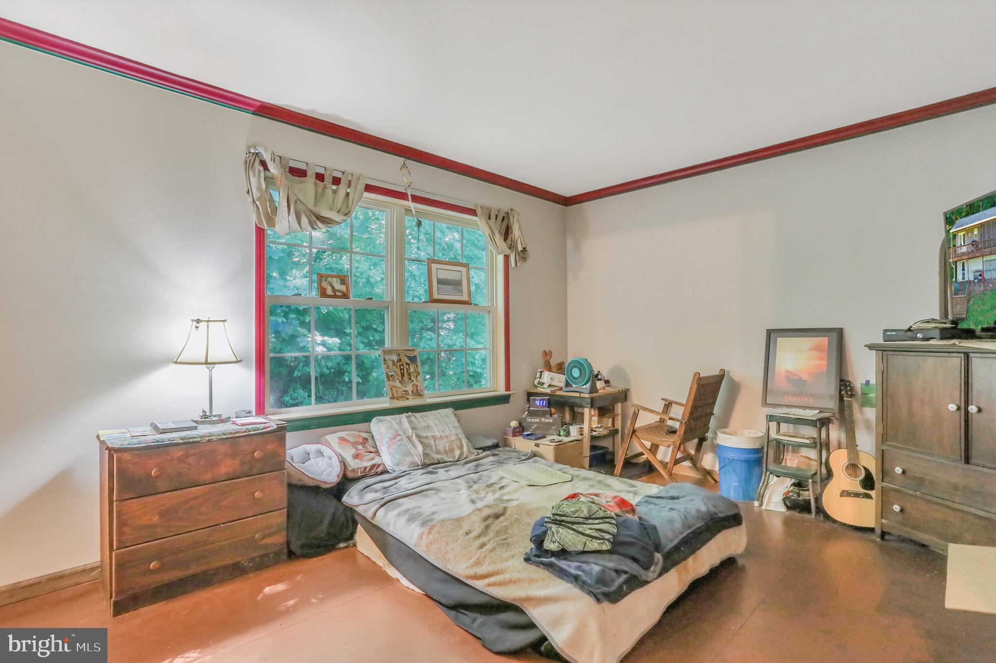 1125 Island Ford Road Rileyville, VA 22650 - Photo 20 of 70 a living room with furniture and a large window
