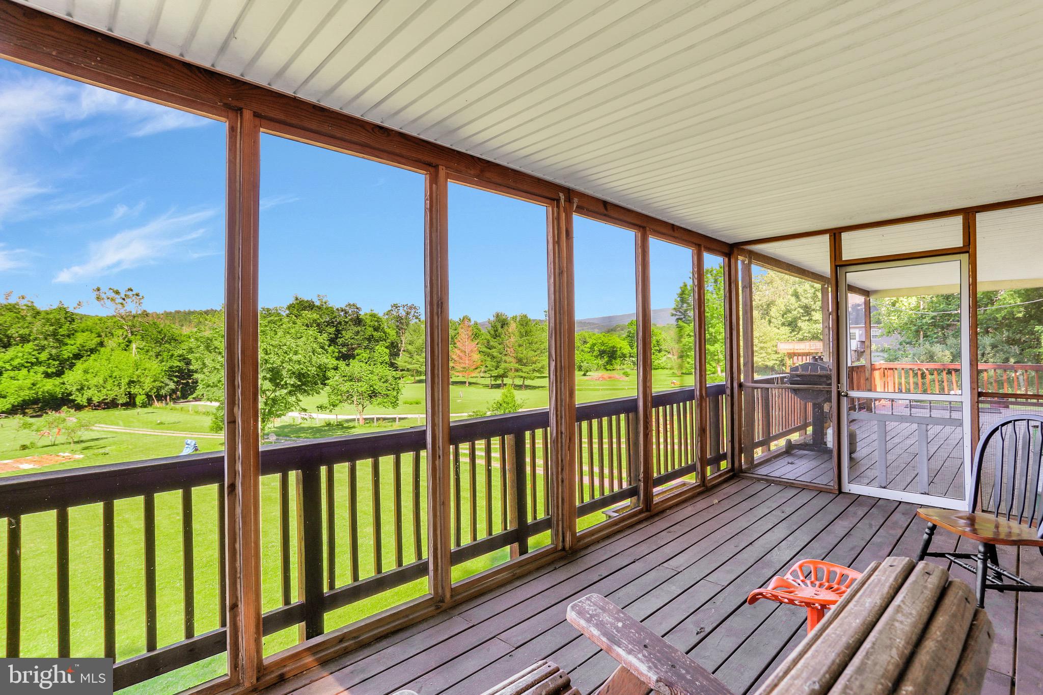 1125 Island Ford Road Rileyville, VA 22650 - Photo 28 of 70 a view of a balcony with wooden floor