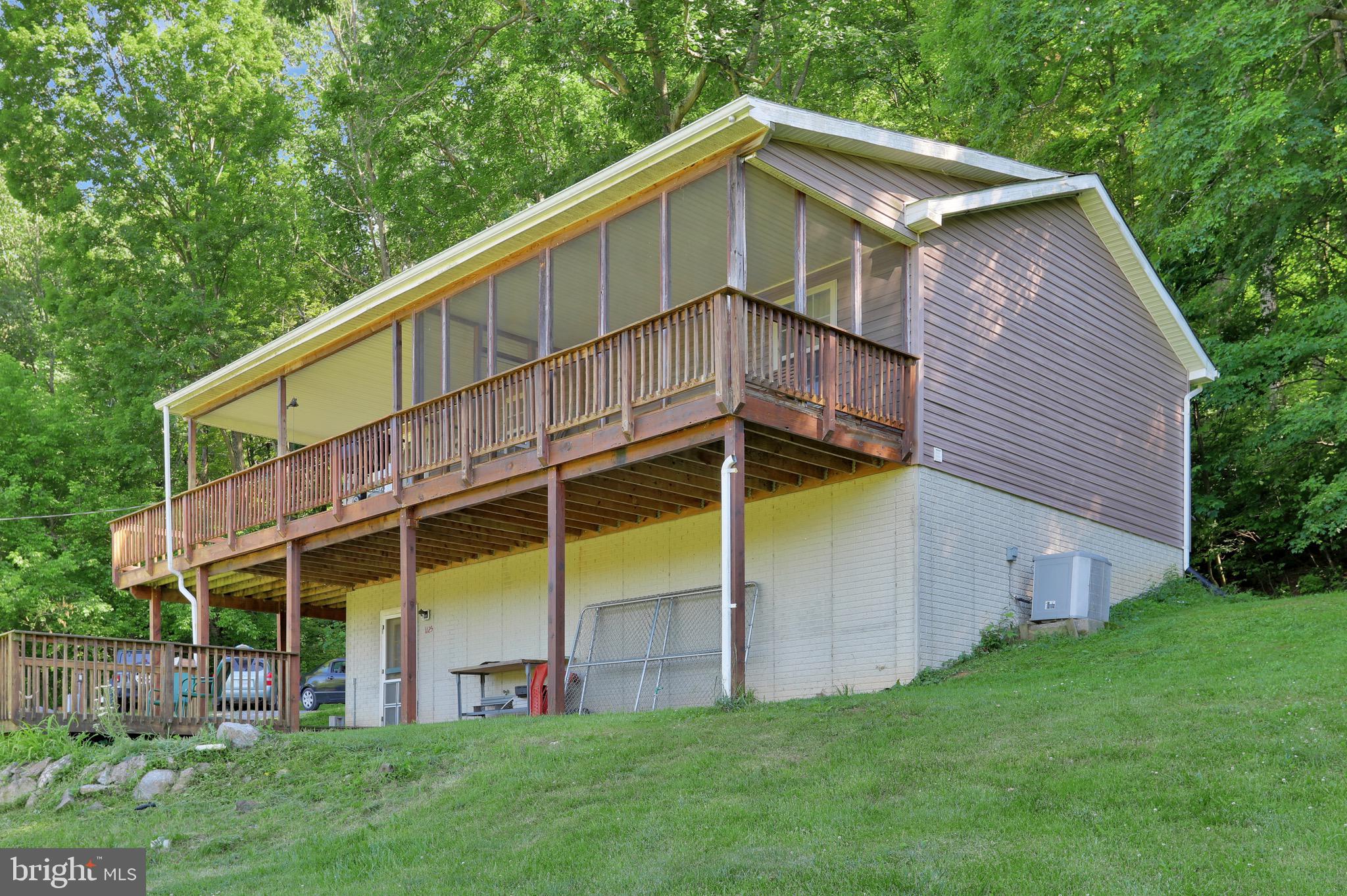 1125 Island Ford Road Rileyville, VA 22650 - Photo 36 of 70 a view of a house with a yard
