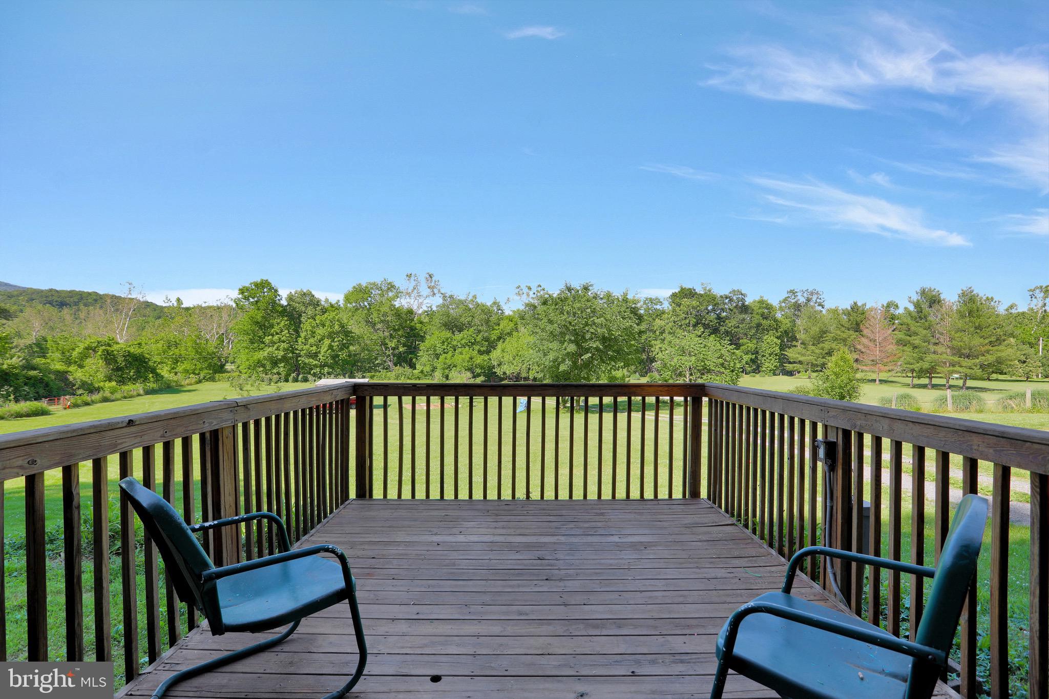 1125 Island Ford Road Rileyville, VA 22650 - Photo 37 of 70 a view of a two chairs on the roof deck