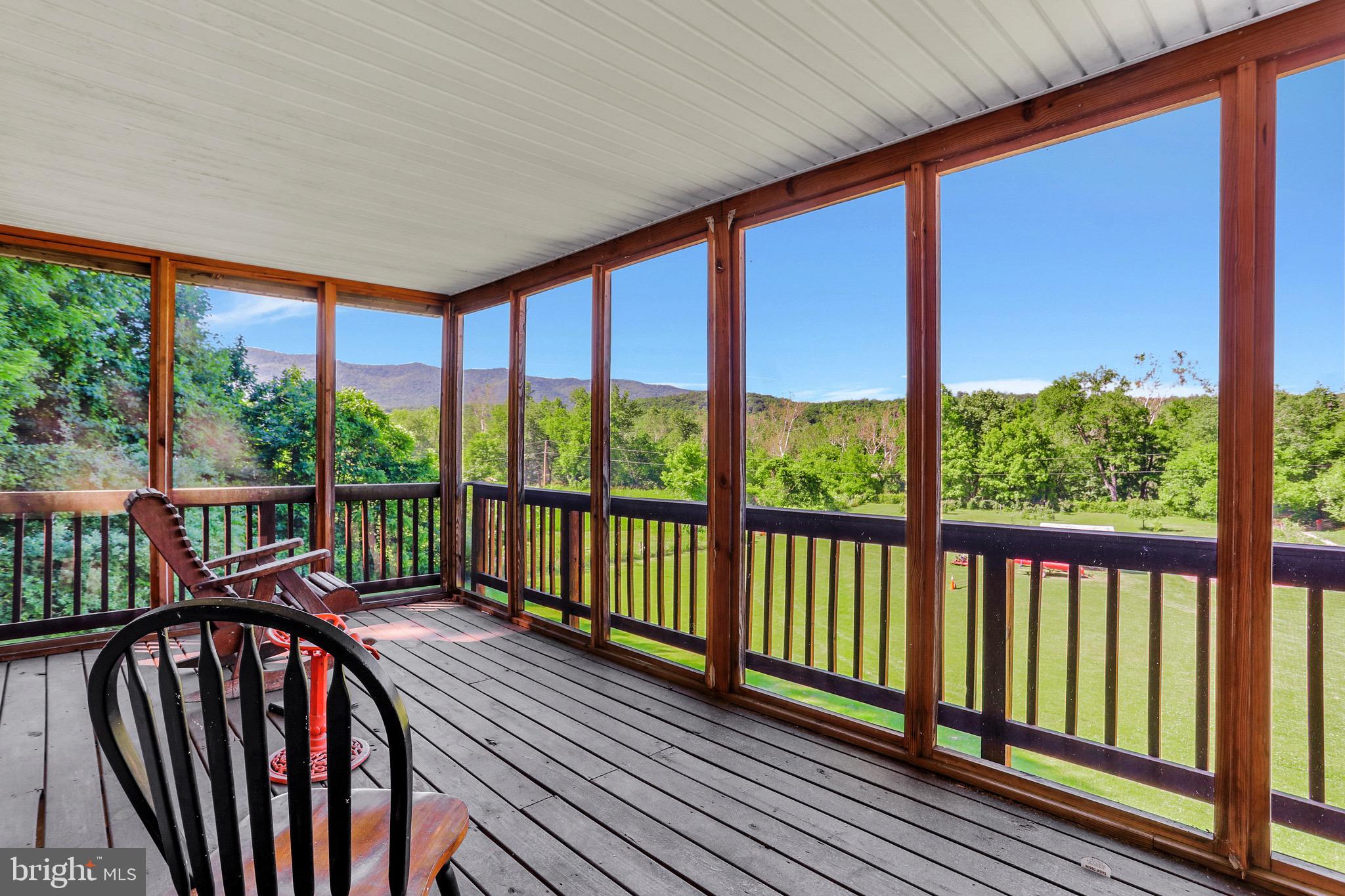 1125 Island Ford Road Rileyville, VA 22650 - Photo 4 of 70 a view of a balcony with furniture