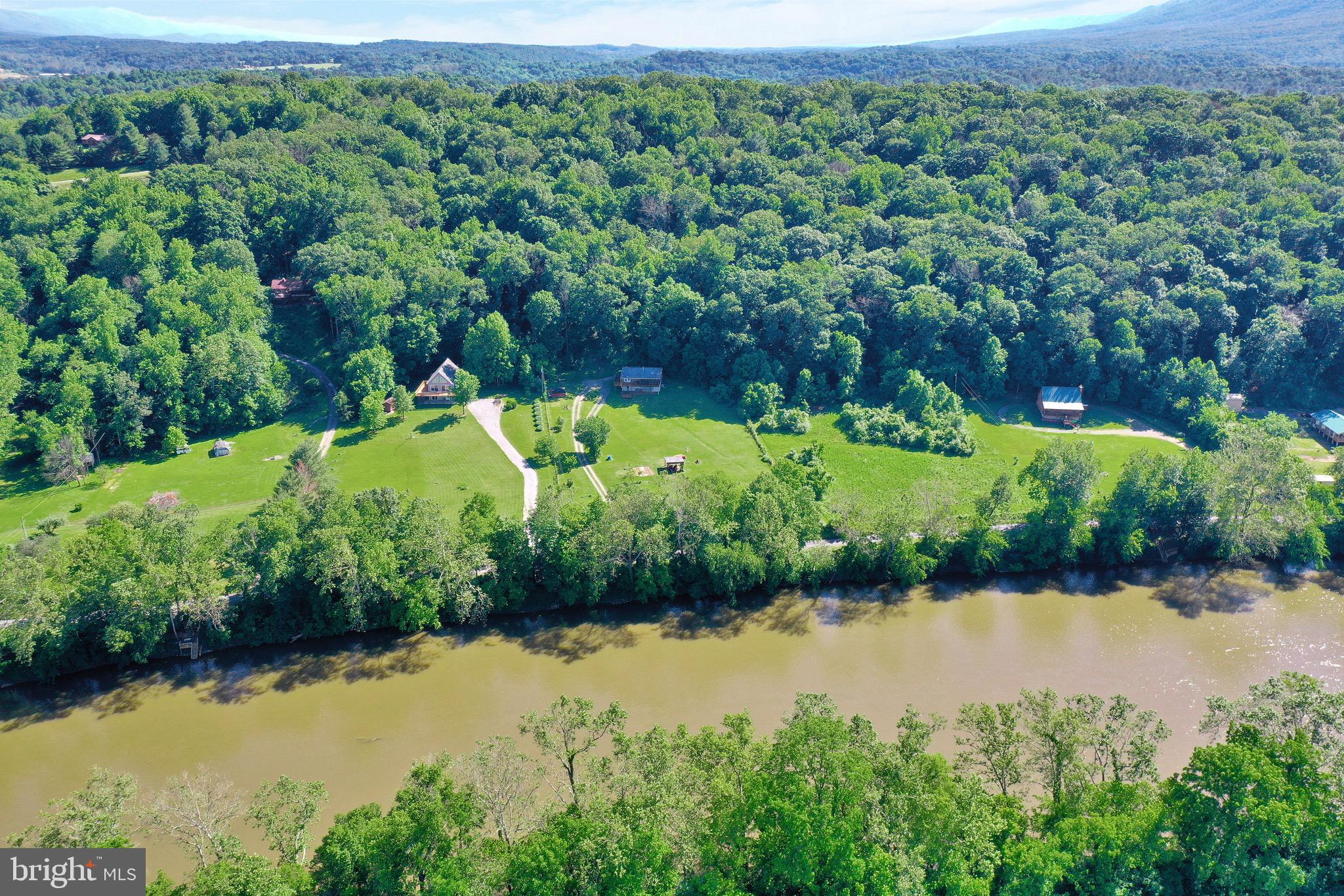 1125 Island Ford Road Rileyville, VA 22650 - Photo 46 of 70 a view of a lake with a city