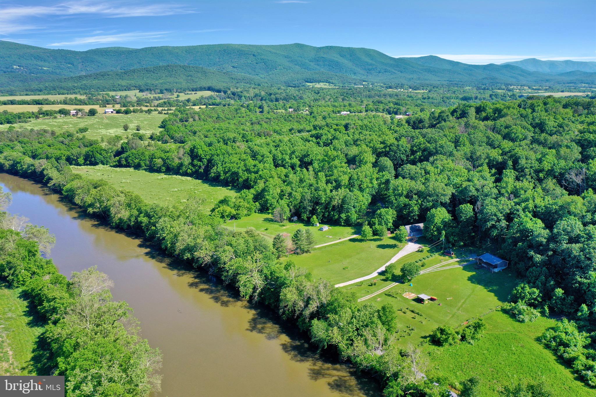 1125 Island Ford Road Rileyville, VA 22650 - Photo 48 of 70 a view of a lush green hillside and mountains