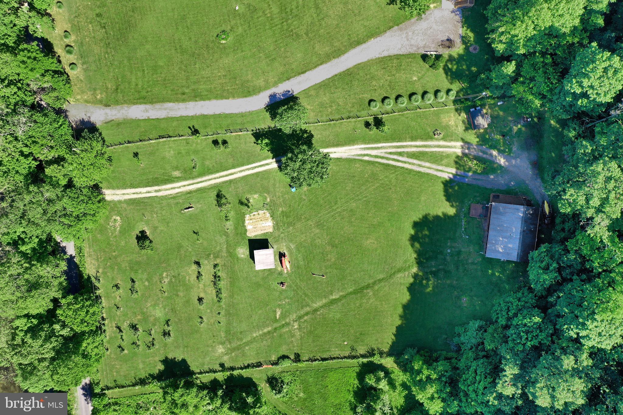 1125 Island Ford Road Rileyville, VA 22650 - Photo 68 of 70 an aerial view of a residential houses with outdoor space and street view