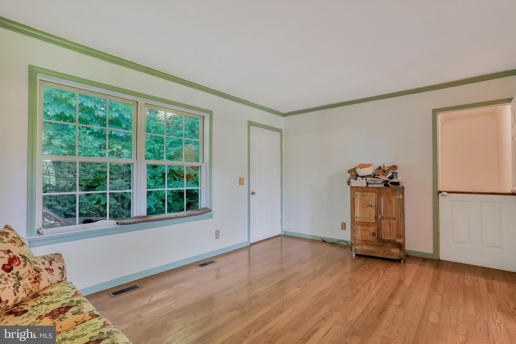 1125 Island Ford Road Rileyville, VA 22650 - Photo 7 of 70 a view of a livingroom with wooden floor and a window