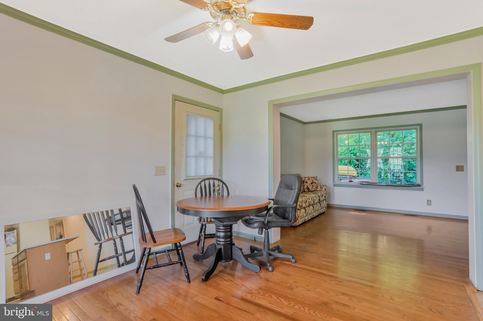 1125 Island Ford Road Rileyville, VA 22650 - Photo 9 of 70 a dining room with furniture and wooden floor