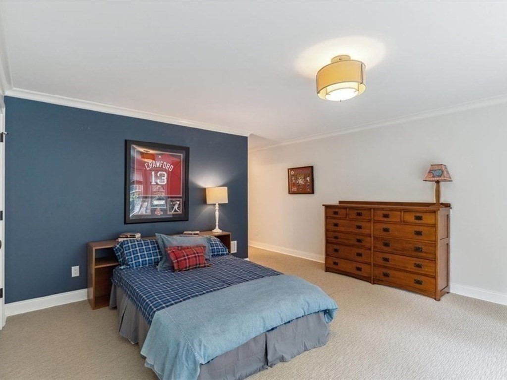 2 Decatur Lane Wayland, MA 01778 - Photo 21 of 35 a bedroom with a bed and cabinets