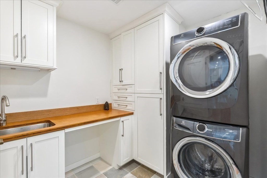 2 Decatur Lane Wayland, MA 01778 - Photo 25 of 35 a utility room with sink dryer and washer