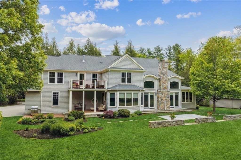 2 Decatur Lane Wayland, MA 01778 - Photo 29 of 35 a front view of a house with a garden