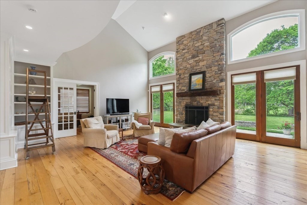 2 Decatur Lane Wayland, MA 01778 - Photo 4 of 35 a living room with furniture and a fireplace