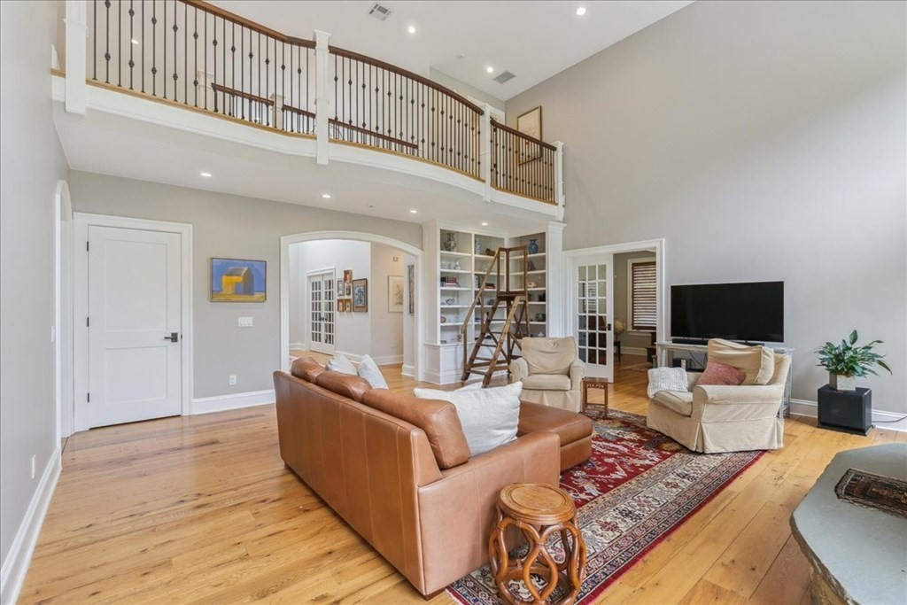 2 Decatur Lane Wayland, MA 01778 - Photo 5 of 35 a living room with furniture and a flat screen tv