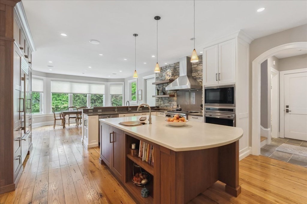 2 Decatur Lane Wayland, MA 01778 - Photo 8 of 35 a open kitchen with stainless steel appliances granite countertop a stove and refrigerator