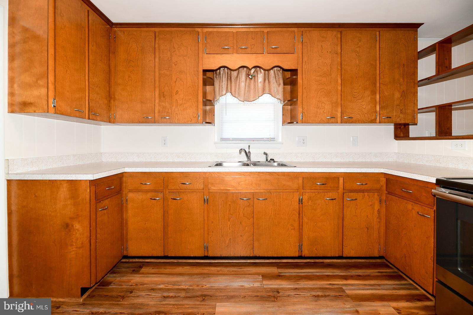 40480 Parsons Mill Road Leonardtown, MD 20650 - Photo 12 of 48 a bathroom with a sink and a mirror