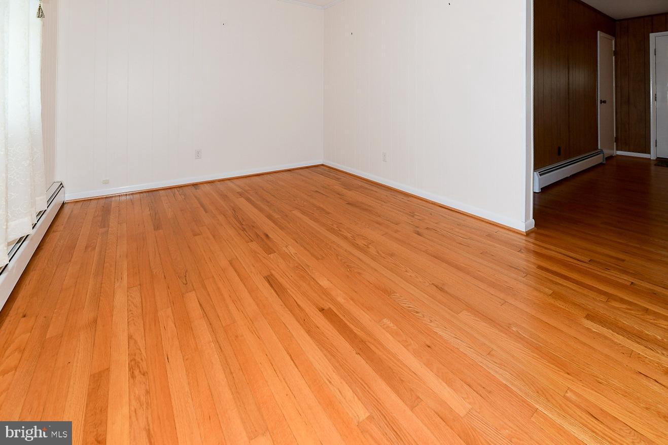 40480 Parsons Mill Road Leonardtown, MD 20650 - Photo 16 of 48 a view of empty room with wooden floor