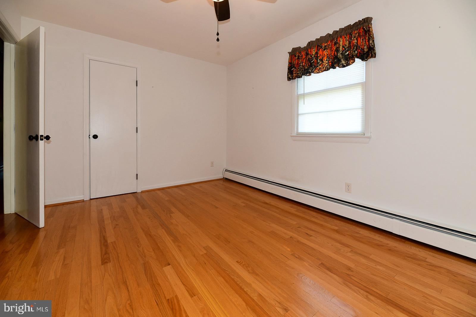 40480 Parsons Mill Road Leonardtown, MD 20650 - Photo 18 of 48 wooden floor in an empty room
