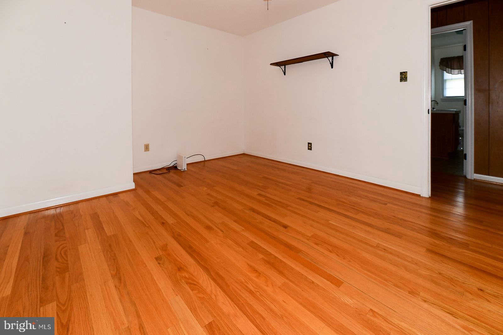40480 Parsons Mill Road Leonardtown, MD 20650 - Photo 23 of 48 a view of empty room with wooden floor