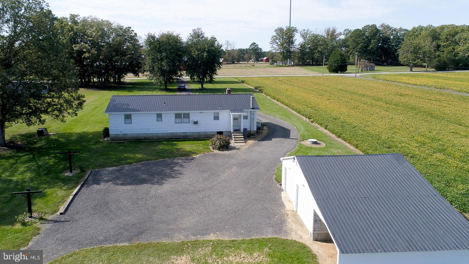 40480 Parsons Mill Road Leonardtown, MD 20650 - Photo 34 of 48 an aerial view of a house with a yard