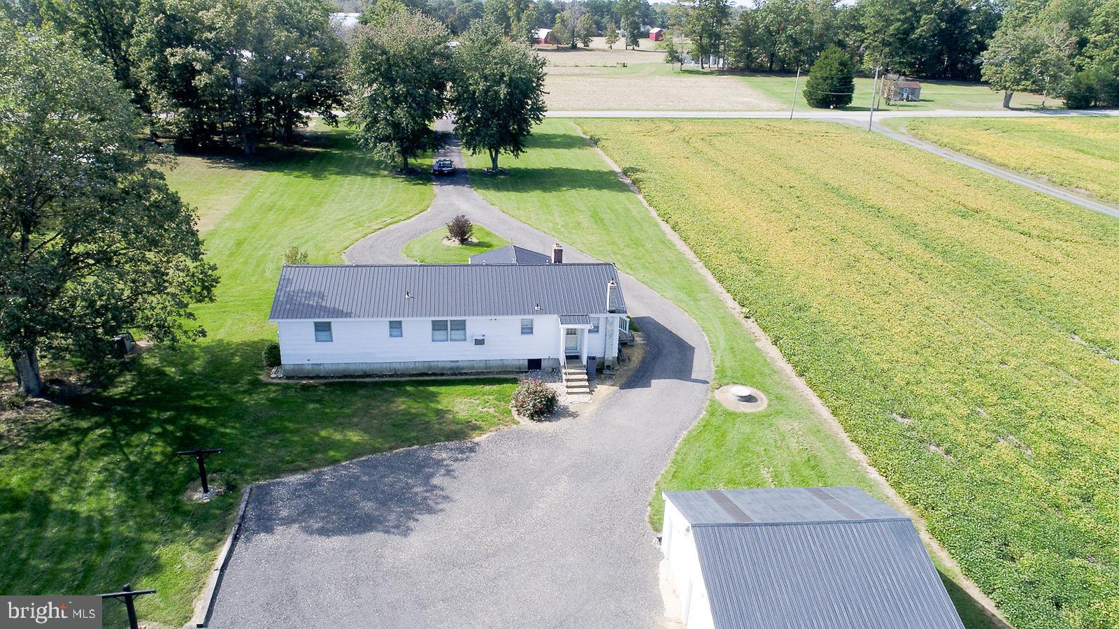 40480 Parsons Mill Road Leonardtown, MD 20650 - Photo 35 of 48 a view of a swimming pool with a yard
