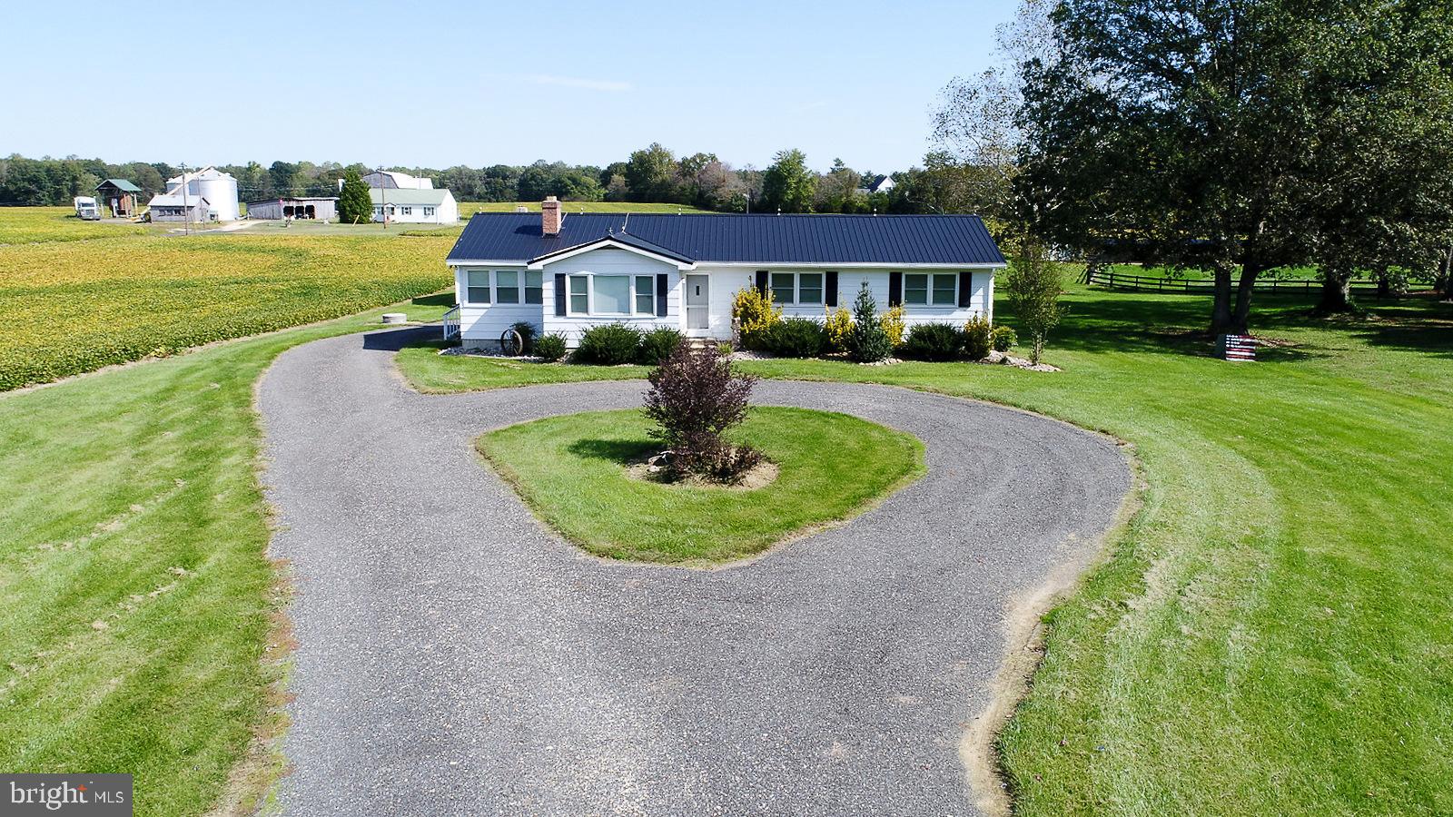 40480 Parsons Mill Road Leonardtown, MD 20650 - Photo 39 of 48 a front view of a house with a yard