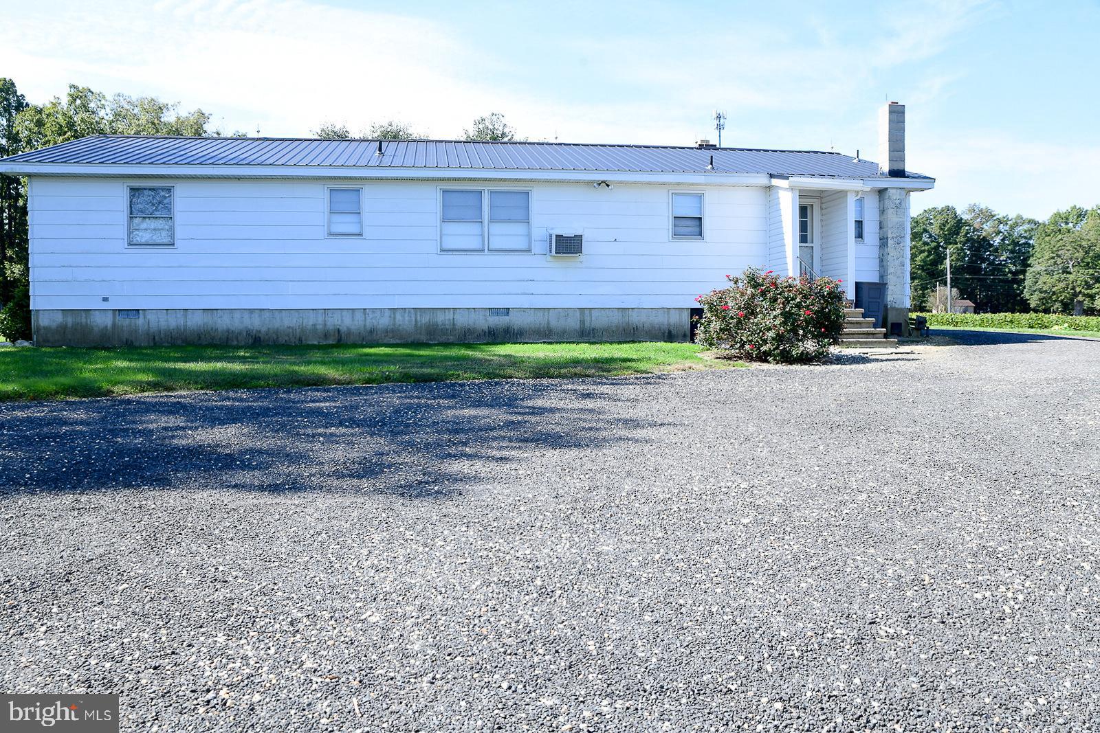 40480 Parsons Mill Road Leonardtown, MD 20650 - Photo 41 of 48 a view of a house with a yard