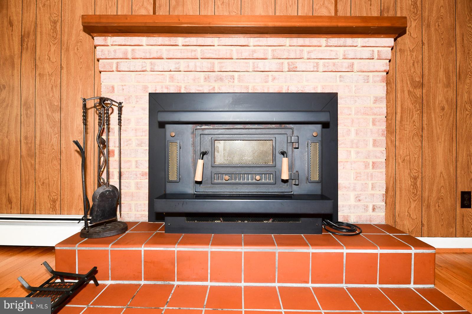 40480 Parsons Mill Road Leonardtown, MD 20650 - Photo 10 of 48 a room with fireplace and windows