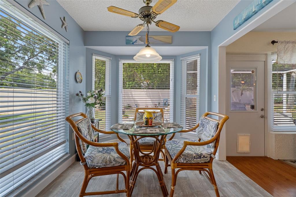 2643 Royal Ridge Drive Spring Hill, FL 34606 - Photo 18 of 84 a view of a dining room with furniture window and outside view