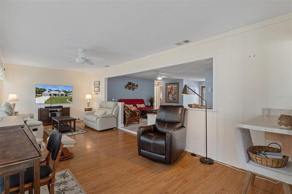 2643 Royal Ridge Drive Spring Hill, FL 34606 - Photo 20 of 84 a living room with furniture and a wooden floor